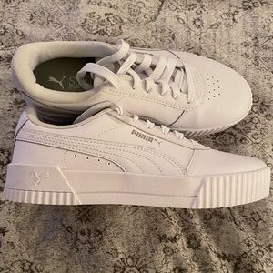 Women’s puma sneakers.  White leather.  Size 7.5